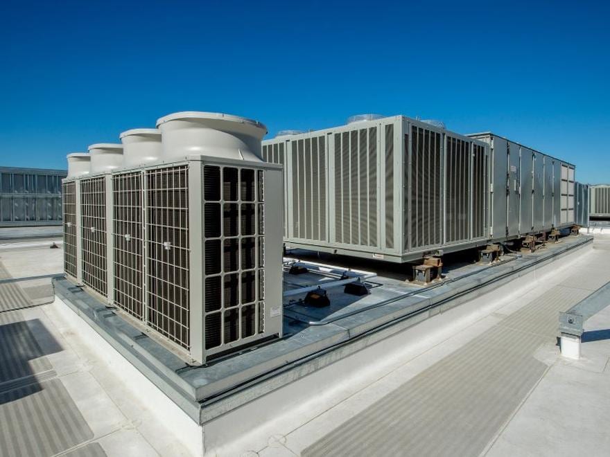 Air-cooled condensing units on a commercial rooftop
