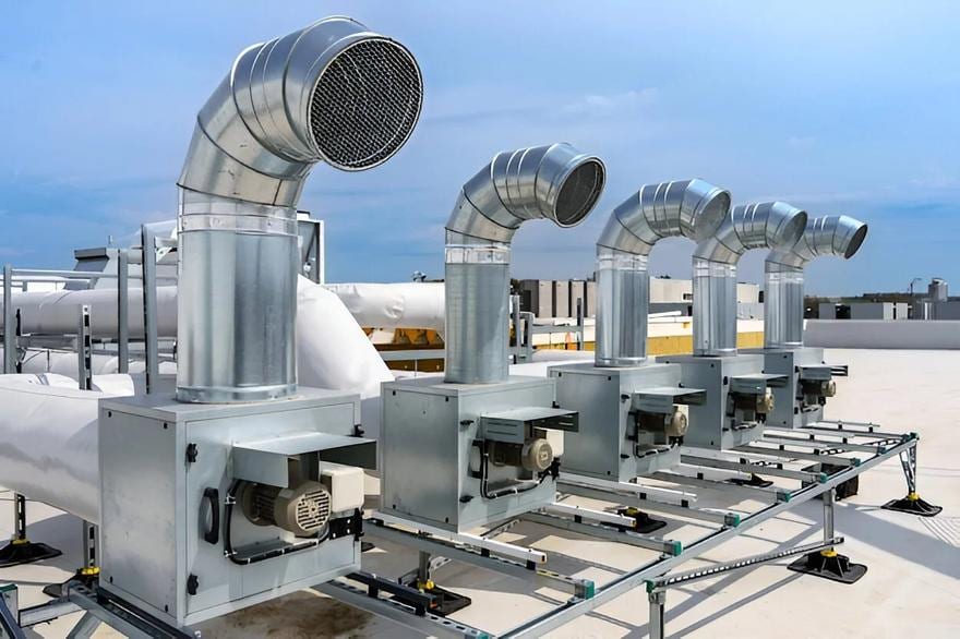 Rooftop exhaust fans with spiral ductwork risers