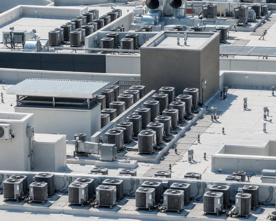 Aerial view of a large rooftop mechanical equipment field