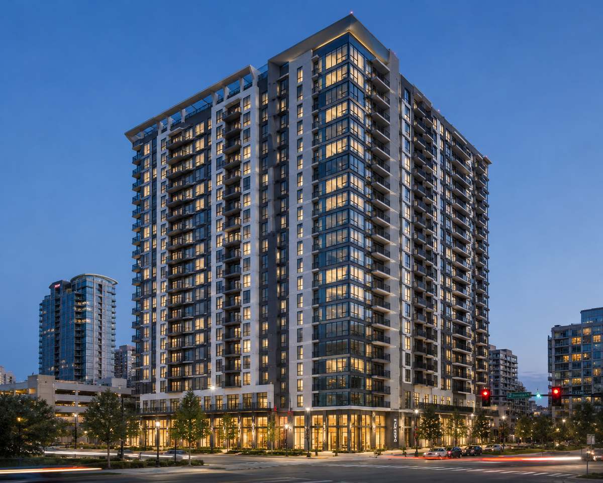 Modern multifamily apartment building exterior with contemporary architecture and clean facade